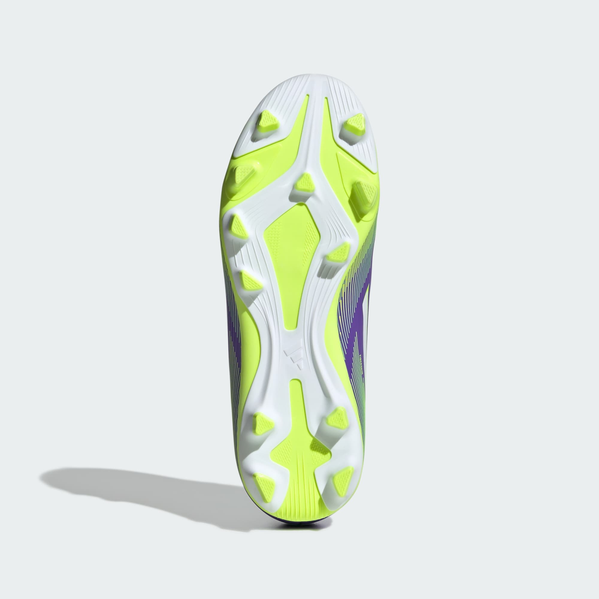 Scarpe da calcio F50 Club per bambini con suola per terreni compatti/multi-superficie.